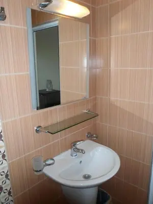 a bathroom with a sink and a mirror at Le studio Summer Breeze in Sunny Beach