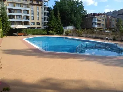 a swimming pool in the middle of a building at Le studio Summer Breeze in Sunny Beach