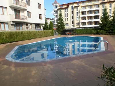 a swimming pool in the middle of a building at Le studio Summer Breeze in Sunny Beach