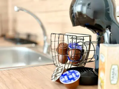 a kitchen counter with a mixer on a counter top at SeaSide 2BR Central apartment in Varna City