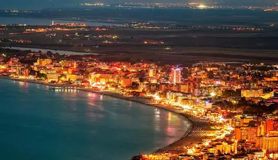 a view of a city at night with lights at Harmony Suites 2 Private Studio 219 in Sunny Beach