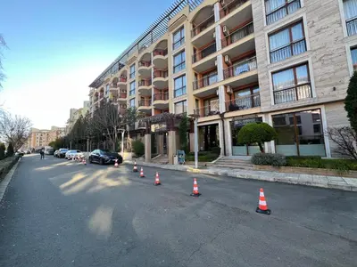 a street with orange cones in front of a building at Harmony Suites 2 Private Studio 219 in Sunny Beach