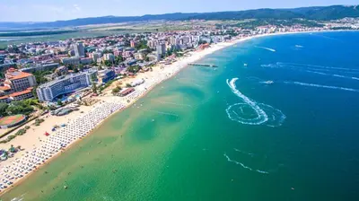 an aerial view of a beach with a boat in the water at Harmony Suites 2 Private Studio 219 in Sunny Beach