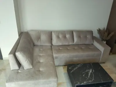 a brown leather couch in a living room at Emperium, Style, Coziness and tranquility by the sea in Sveti Vlas! in Sveti Vlas