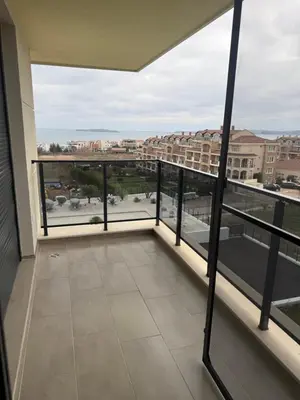 a balcony with a view of a city at Valena Royal apartment in Chernomorets