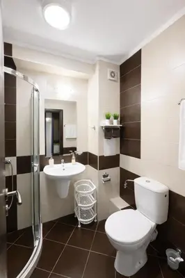 a bathroom with a toilet and a sink at Harmony Suites 2 Private Studio 409 in Sunny Beach