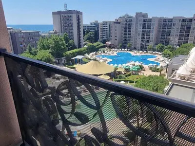 a balcony with a view of a pool and buildings at ROYAL BEACH HOTEL apartment SEA B in Sunny Beach