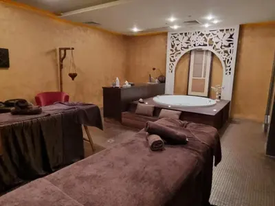 a bathroom with two beds and a bath tub at ROYAL BEACH HOTEL apartment SEA B in Sunny Beach
