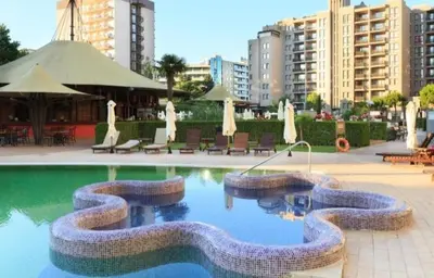 a swimming pool in the shape of a snake at ROYAL BEACH HOTEL apartment SEA G in Sunny Beach