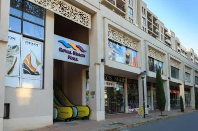 a store on a city street with many windows at ROYAL BEACH HOTEL apartment SEA G in Sunny Beach