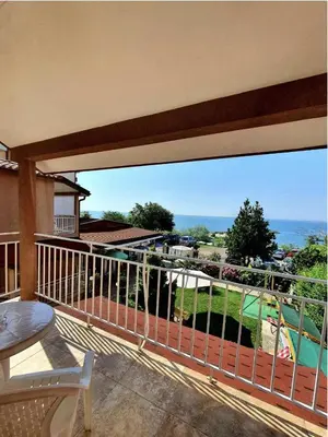 a balcony with a view of a swimming pool at Family house ''Siema'' in Nesebar