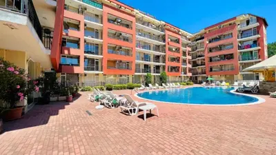 a swimming pool in the middle of a building at Sunset Beach 3 - Menada Apartments in Sunny Beach