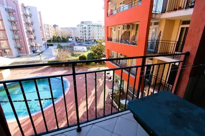 a balcony of a building with a swimming pool at Sunset Beach 3 - Menada Apartments in Sunny Beach