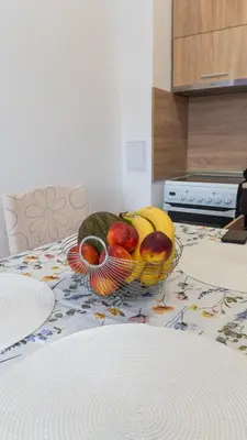 a bowl of fruit sitting on a table at Soleil Bleu Beachfront Getaway in Nesebar