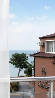 a view of the ocean from the balcony of a hotel at Soleil Bleu Beachfront Getaway in Nesebar