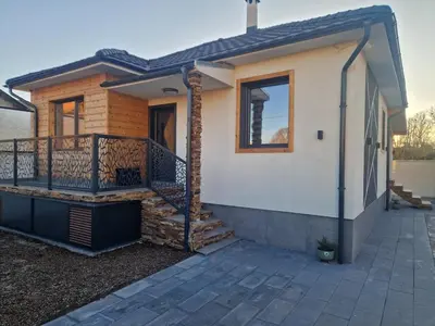 a home with a porch and a balcony at Family House Burgas in Burgas City