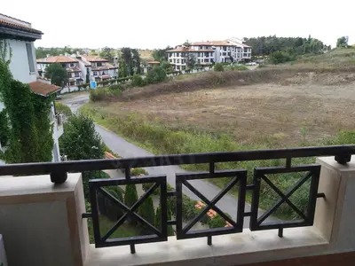 a balcony with a view of a road and houses at Oasis Resort&Spa Lozenets Studio 2 in Lozenets