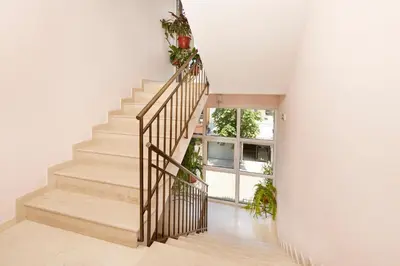 a staircase in a house with plants at Guesthouse Kirov in Ravda