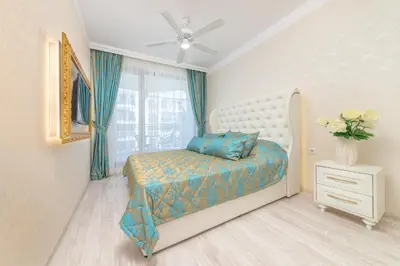 a bedroom with a bed and a window at Harmony Suites Saint Vlas in Sveti Vlas
