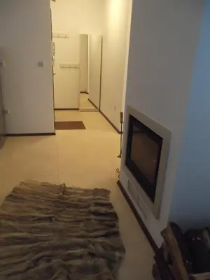 a room with a flat screen tv in a room at Apartment Sredna Gora in Burgas City