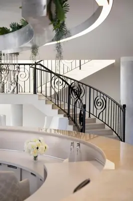 a staircase in a living room with a sink at Hotel Residence Dune - Free Beach Access in Sunny Beach