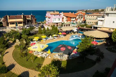 an aerial view of a resort with a swimming pool at Hotel Sunny in Sozopol