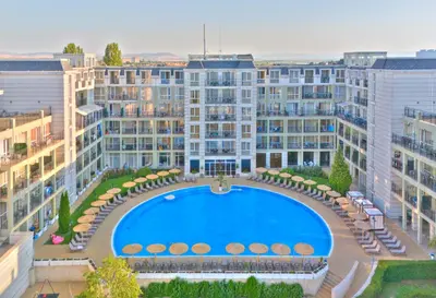 an overhead view of an apartment complex with a swimming pool at Festa Pomorie Resort in Pomorie