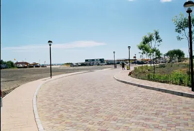 a brick road with street lights on the side at Boutique Suites Rainbow 4 in Sunny Beach