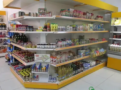 a store aisle with shelves filled with food and drinks at Visit Sunny Beach Marina Apartments in Ravda