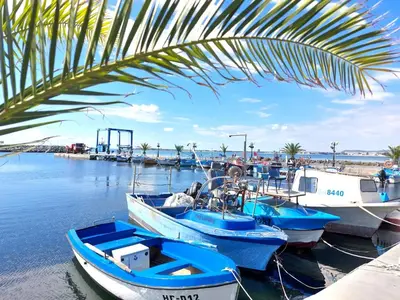 a group of boats are docked in a harbor at Vega Village Ap B39 in Sveti Vlas