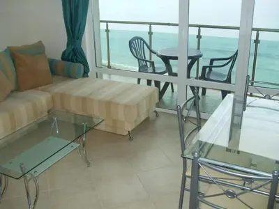 a living room with a couch and a table at Samara Apartment in Lozenets