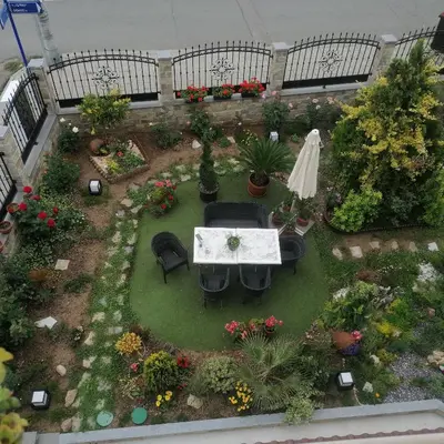 an aerial view of a garden with a table and chairs at Apartments Dona in Chernomorets