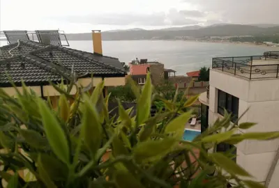 a view of the water from a building at Apartments Provence in Sozopol