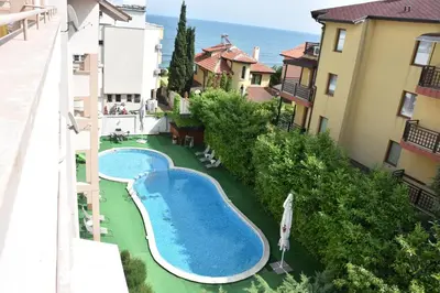 an overhead view of a swimming pool on a balcony at Aparthotel Lucky Family in Ravda