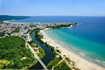 an aerial view of a beach and the ocean at Apartment Kraev in Primorsko