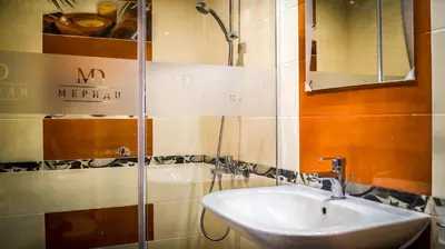 a bathroom with a sink and a mirror at Guest House Meridi in Priseltsi