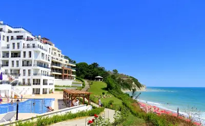 a view of a hotel and the ocean at Бяла Виста Клиф - Byala Vista Cliff in Byala