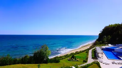 an aerial view of the ocean and a beach at Бяла Виста Клиф - Byala Vista Cliff in Byala