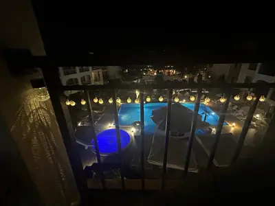a view of a room with a table and lights at Paradise Bay D8 Apartment in Sozopol