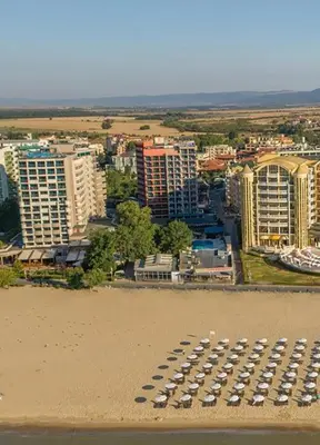 an aerial view of a beach with a parking lot at Hotel Shipka Beach in Sunny Beach