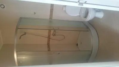 a shower in a bathroom with a glass window at Casa del Sol Apartments in Sunny Beach