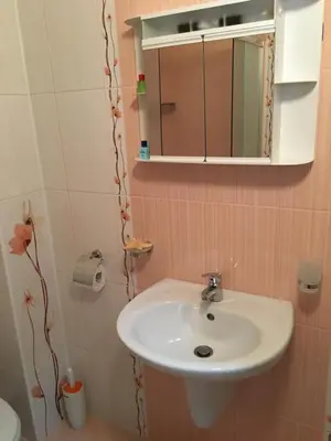 a bathroom with a sink and a mirror at Studio Martin in Pomorie