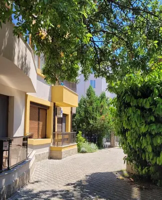 an empty street in front of a building at Sirena Holidays in Ravda