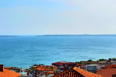 an aerial view of a city and the ocean at Joro Guest House in Sveti Vlas