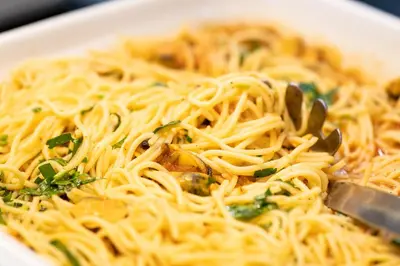 a bowl of spaghetti with a fork in it at Hotel Neptun Beach in Sunny Beach