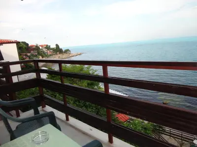 a balcony with a view of the ocean at Apartments Anita in Nesebar