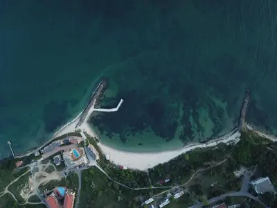 an aerial view of an island in the ocean at St. Panteleimon Beach Hotel in Nesebar