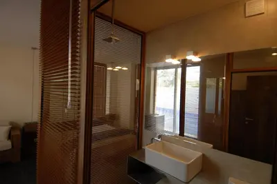 a bathroom with a sink and a mirror at Design Hotel Logatero in Sozopol
