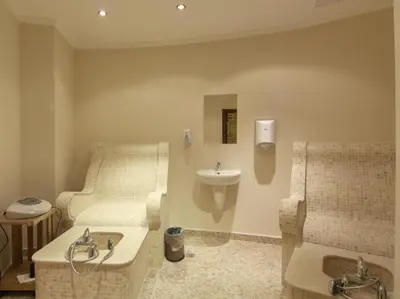 a bathroom with a sink and a toilet and a sink at Edmond Apartment-Highspeed-Internet-Free! in Aheloy