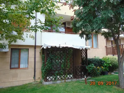 a building with a gate in front of it at Болгария, г.Свети Влас, к.
